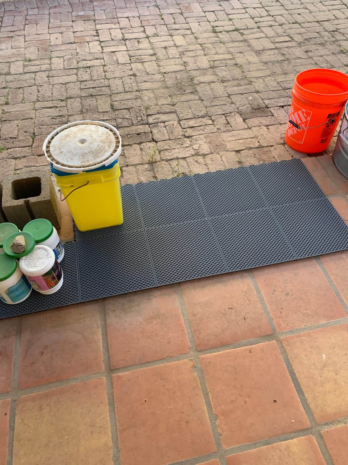 Backyard patio drainage floor