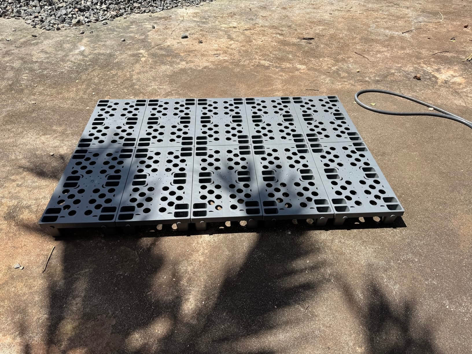 Backyard patio drainage floor